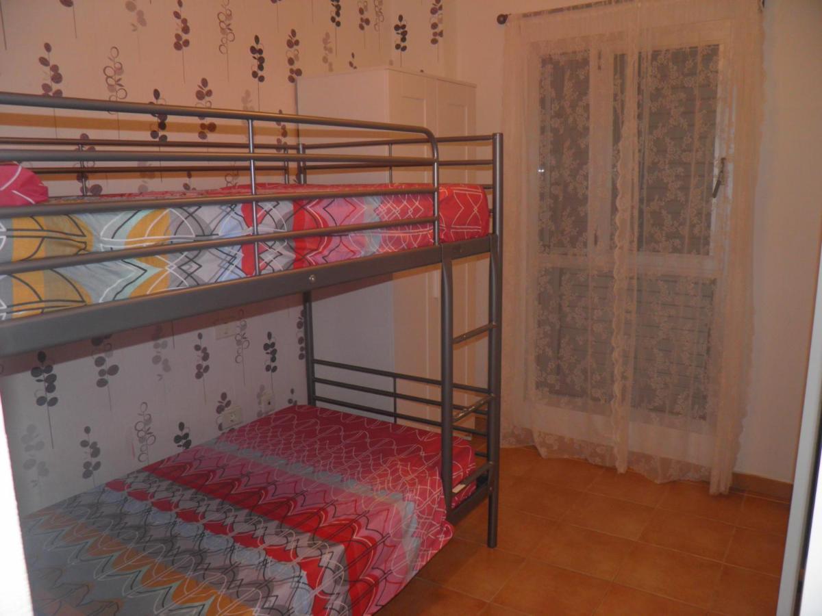 Апартаменты Apartamento En Playa De Сардина Экстерьер фото